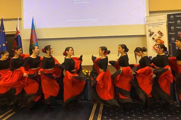 A group of young Roma girls dancing